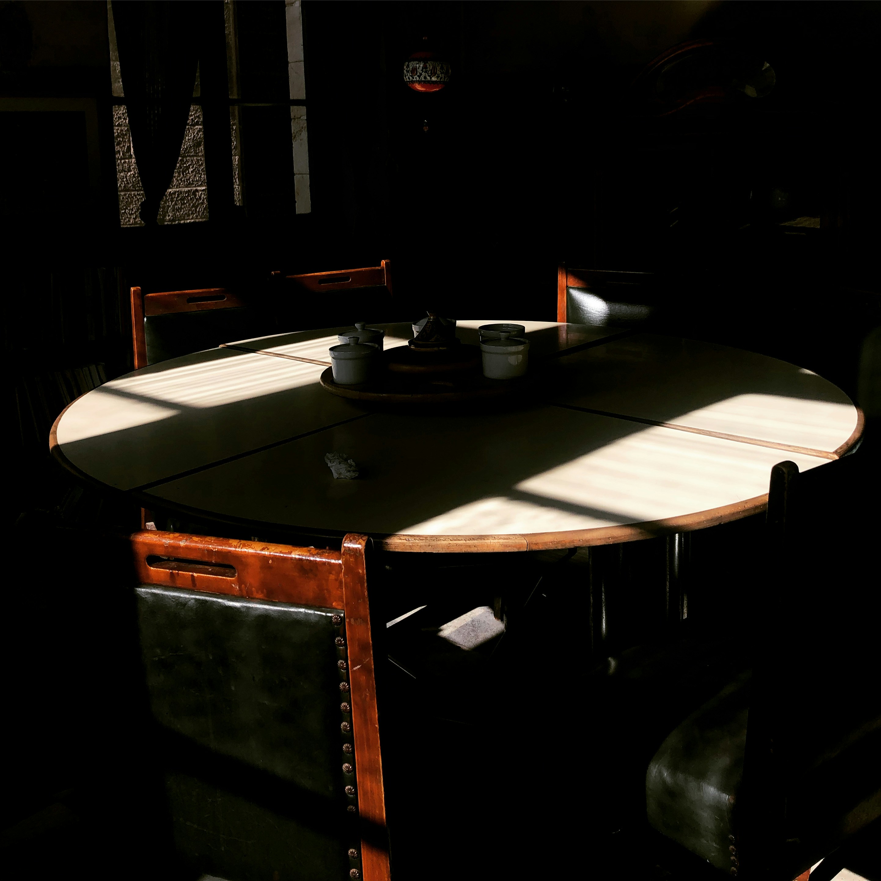black ceramic plate on white table